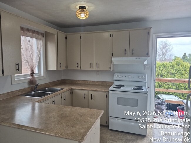 Building Photo - 10535 Rue Principale