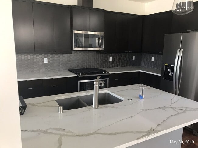 Building Photo - Stunning Liberty Lake Townhouse