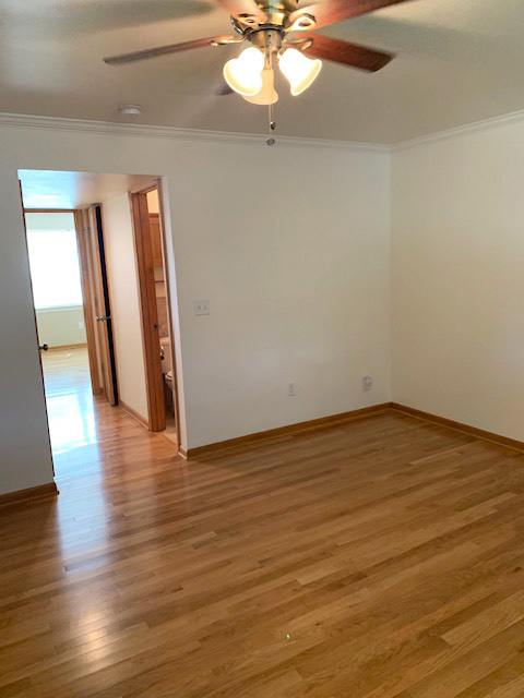 Family room looking down hall - Park Hill Apartments