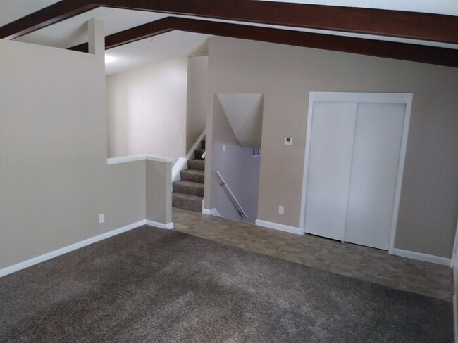 Building Photo - Corner Lot and Vaulted Ceilings!