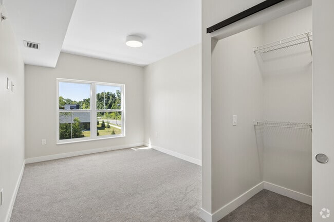 3BR, 3BA - 1,480SF - Primary Bedroom - Brightdawn Village Apartments