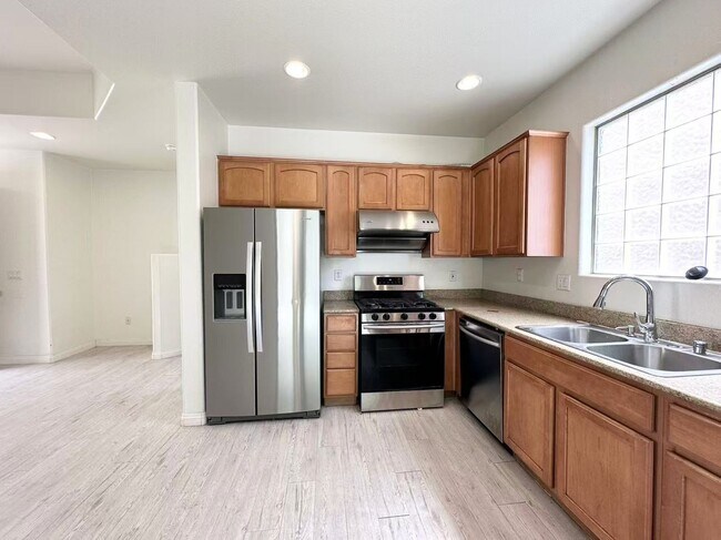 Building Photo - Spacious 4-Bedroom Home in Gated Community...