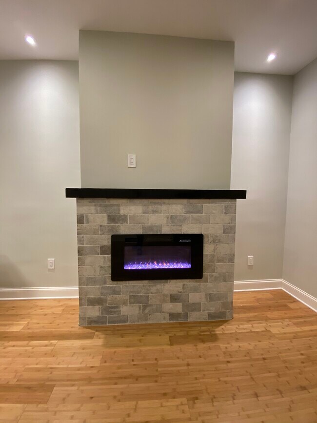 Modern fireplace - 6813 Palisade Ave