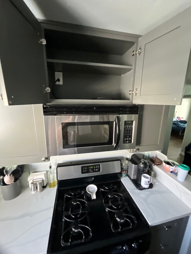 New cabinets, new microwave, new refrigerator - 5525 Canoga Ave