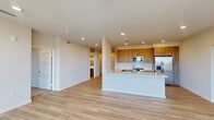 Located at 398 West Valley Boulevard in San Gabriel, CA, this thoughtfully designed single-story residence offers three bedrooms and four bathrooms across a generously sized floor plan. The open-concept kitchen and living area serves as the heart of the home, showcasing warm wood-toned cabinetry, white quartz countertops, stainless steel appliances including a gas range, built-in microwave, and a French door refrigerator with an ice dispenser. Light wood vinyl plank flooring flows throughout the main living areas, creating a bright, cohesive aesthetic complemented by recessed lighting and a neutral color palette. The spacious primary bedroom features recessed lighting and connects to a well-appointed en suite bathroom with a dual-sink vanity, wood cabinetry, white quartz countertops, and backlit LED mirrors. A large walk-in closet with built-in shelving and carpeted flooring provides ample storage. Additional bedrooms are carpeted and benefit from natural light through large windows with open views of the surrounding neighborhood. The bathrooms throughout maintain consistent, modern finishes. A dedicated hallway and closet further enhance the home's functional layout, making this residence a polished and practical living space in the heart of San Gabriel.