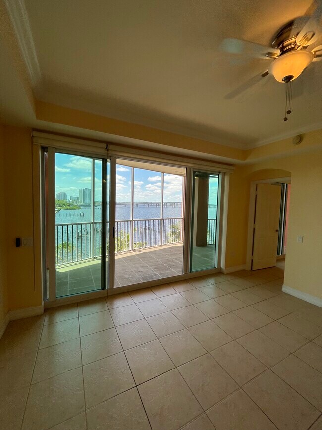 Living room, with Caloosahatchee view onto lanai - 2743 1st St