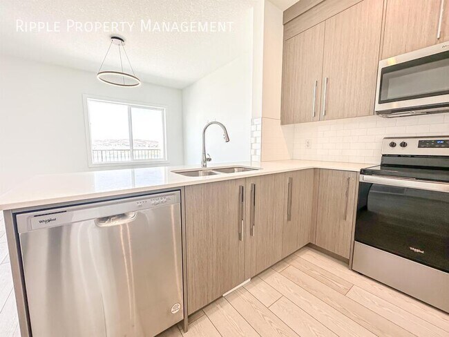 Photo du bâtiment - GREAT 4 BEDS/ 2.5 BATHS TOWNHOUSE IN THE COMMUNITY OF CREEKSTONE