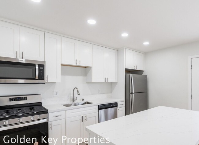 Building Photo - Welcome to your beautifully renovated sing...