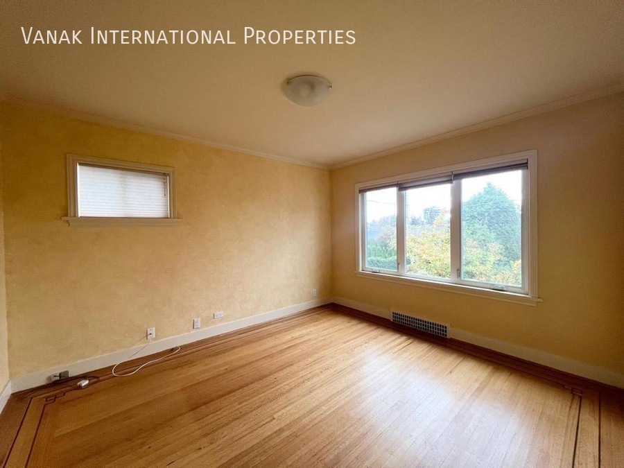 Primary Photo - Bright 4 Bedroom Home in Prime West Vancou...