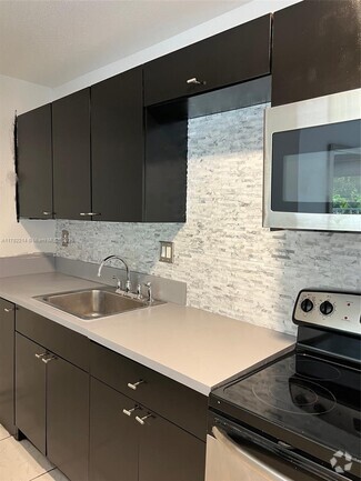 Building Photo - 4200 NW 79th Ave