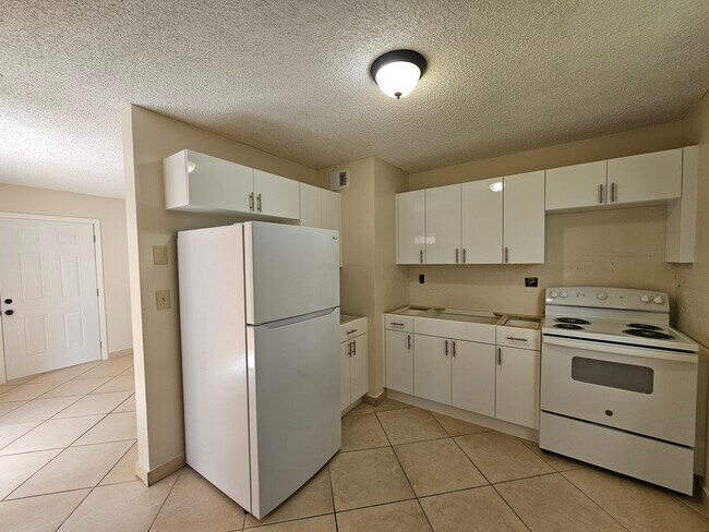 Quartz countertop & micro will be installed. - 1235 NW 6th St