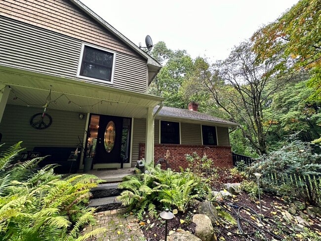 Photo - Dream Home in Highland, Michigan: Your Private Oasis on 5 Wooded Acres