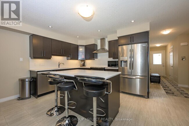 Photo du bâtiment - 1220 Riverbend Rd
