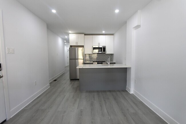 Foto del edificio - 103 E Coulter St