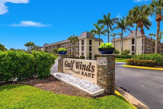 Building Photo - AVAILABLE NOW! Furnished Ground-Floor End Unit | Lake & Pool Views | Minutes to Marco Island & Do...