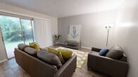 Located at 1303 Ocala Rd in Tallahassee, FL, this single-floor residence offers a well-organized layout designed for comfortable everyday living. The living room serves as the heart of the home, featuring wood-look flooring, neutral gray walls, a textured ceiling, and a sliding glass door dressed with sheer vertical blinds that invite abundant natural light. The open feel is enhanced by a generous floor plan that flows naturally from room to room. The galley-style kitchen is efficiently designed with gray cabinetry, light countertops, a stainless steel sink, and black appliances including a refrigerator, range, and dishwasher, all set atop wood-look tile flooring. Adjacent to the kitchen is a cozy dining nook with its own window, providing a dedicated space for casual meals. The two bedrooms are carpeted for comfort and each features a window that brings in natural light, creating bright and restful retreats. The bathrooms are clean and functional — one features a tub-shower combo with wood-look tile flooring and a vanity with light countertops, while the second offers a similarly appointed vanity with a mirror. Together, these spaces create a practical, move-in-ready home in a convenient Tallahassee location.