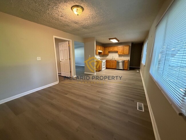 Photo - Updated 4-Bedroom Near Eagle Creek Park with Spacious Yard, Available NOW! House