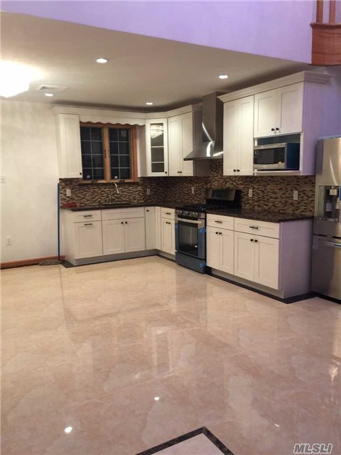 Foto del edificio - 150-43-150-18 18th Ave