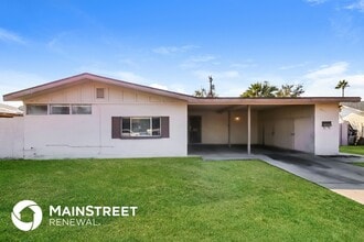 Building Photo - 6211 W Indianola Ave