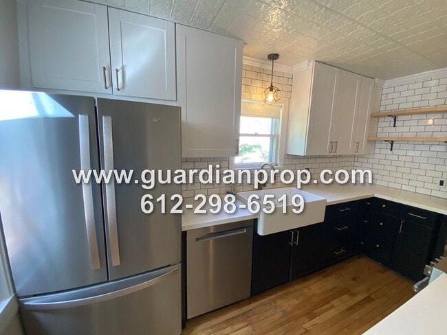 Building Photo - Updated House Available August 1, Hardwood...