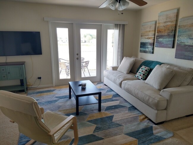 Bright and sunny living room - 149 Seahorse Dr SE