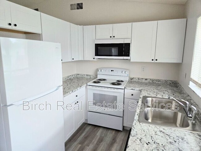 Foto del edificio - 5122 Muriel Ln