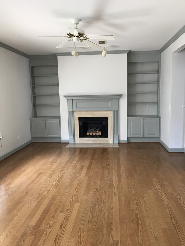 Main open floor living room with gas fireplace - 7245 HWY 70S