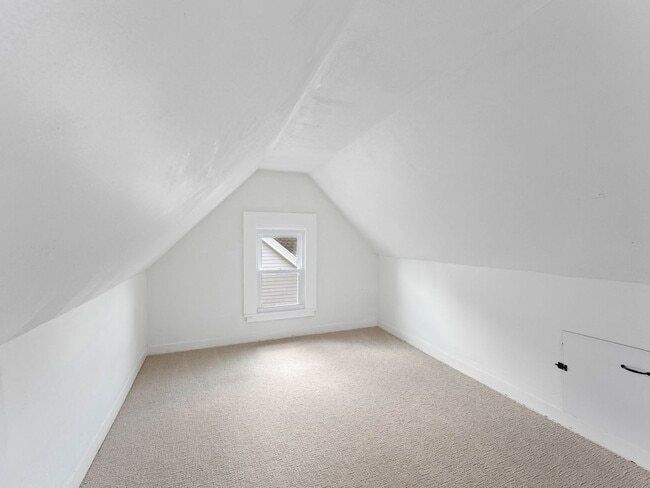 Building Photo - Renovated 3-Bedroom Apartment with Bonus Finished Attic & Spacious Shared Backyard