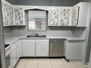 Building Photo - 3100 Coral Springs Dr