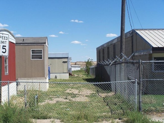 Rear View to East - 702 Daley St