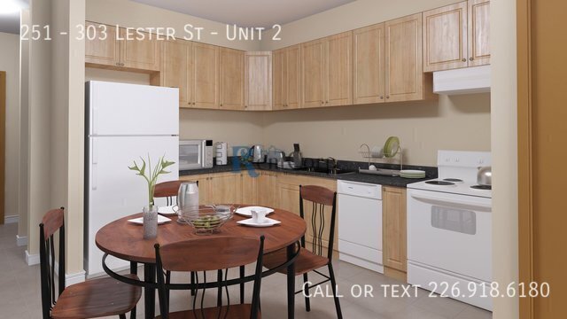 Photo du bâtiment - 303-303 Lester St