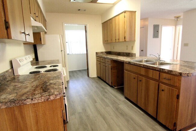 Building Photo - Home available now!