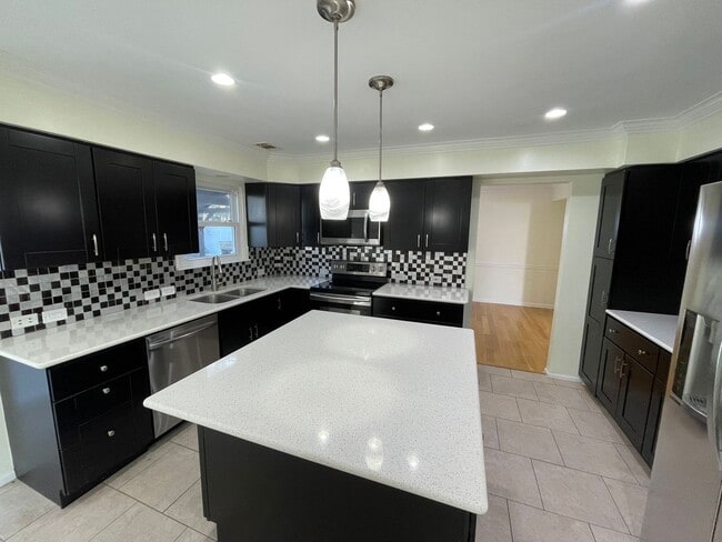 Building Photo - Beautifully updated home on large corner lot