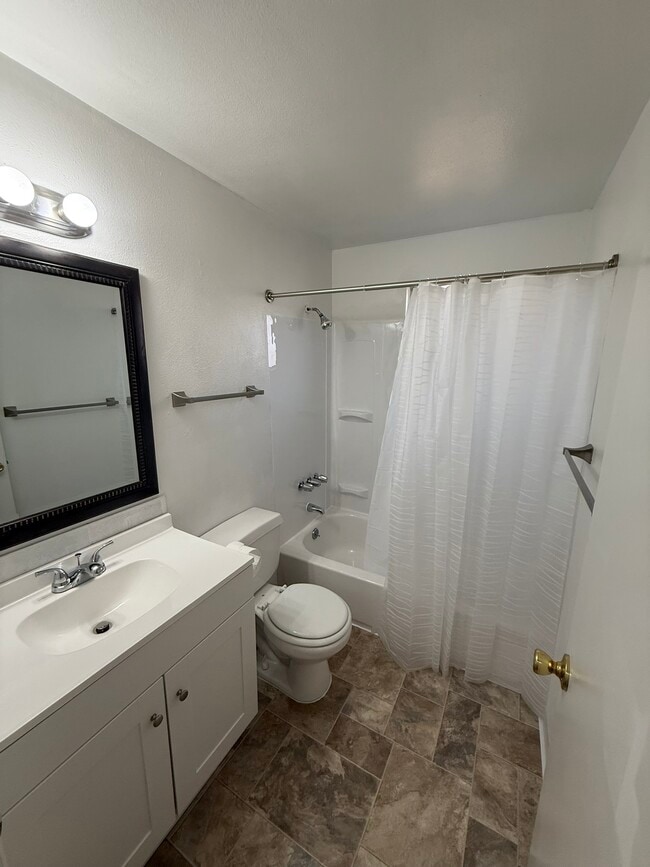 Bathroom with tub and shower - 2403 s kimball ave