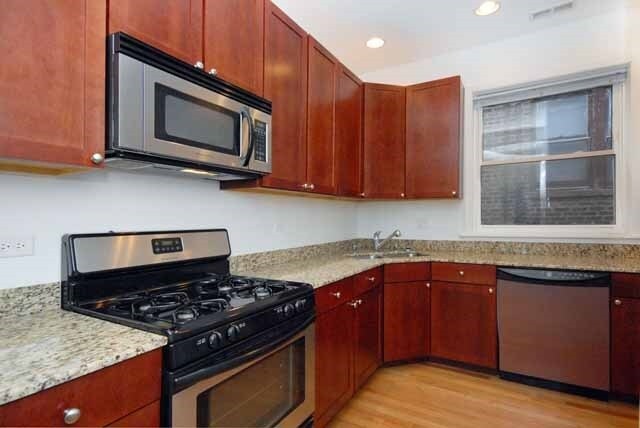 Foto del edificio - 6910 N Lakewood Ave