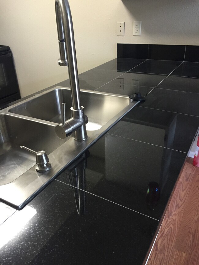 Granite countertops - 14066 E Stanford Cir
