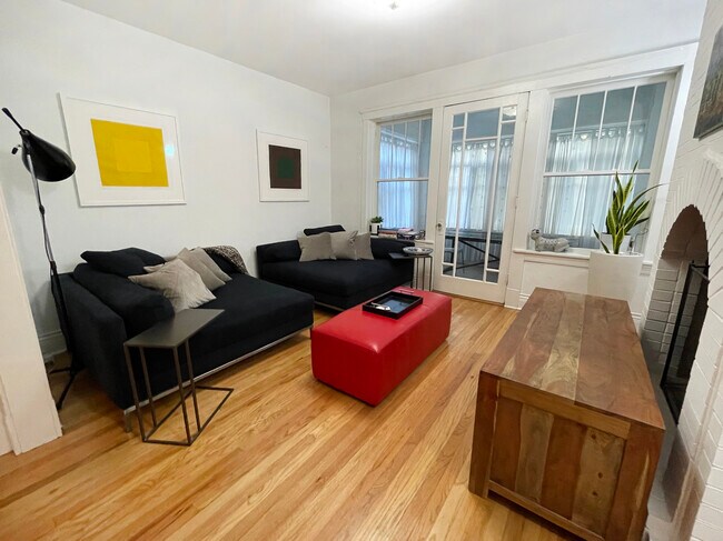 Bright, spacious living room with working fireplace - 2723 W Agatite Ave