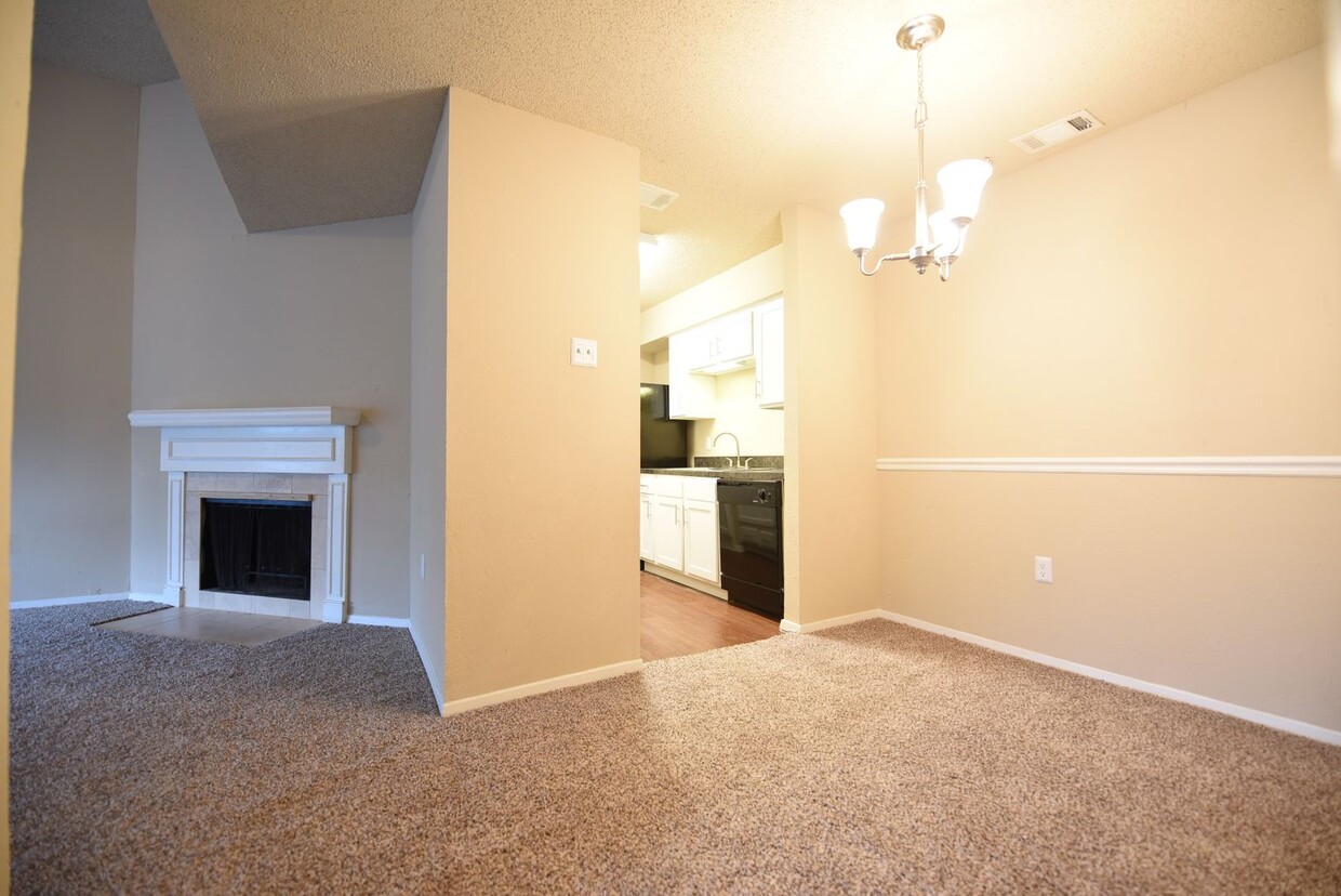 Primary Photo - Second floor unit remodeled with fireplace!