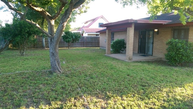 back yard, back covered porch - 1405 E Catherine Cir