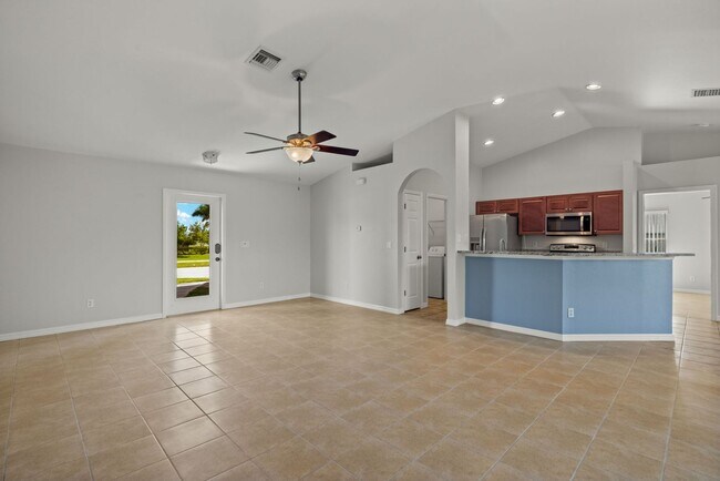 Building Photo - This Beautiful SW 3/2/2 Home is move-in re...