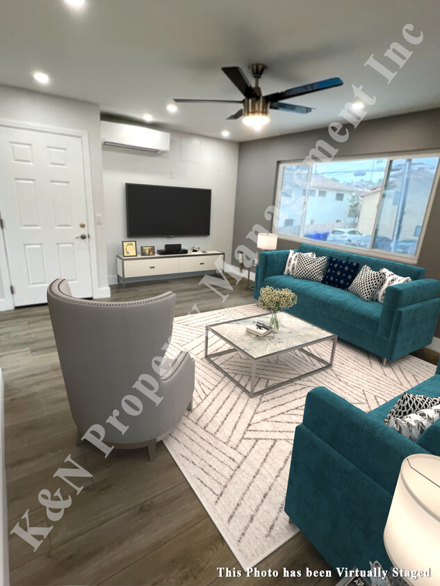 living room with can lights and ceiling fan - 1872 Diamond St