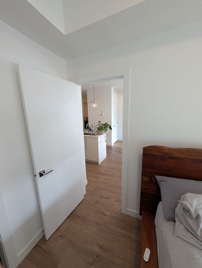 Building Photo - Modern 2 Bedroom + Den Condo with Underground Parking in Skyview Ranch (IP059)