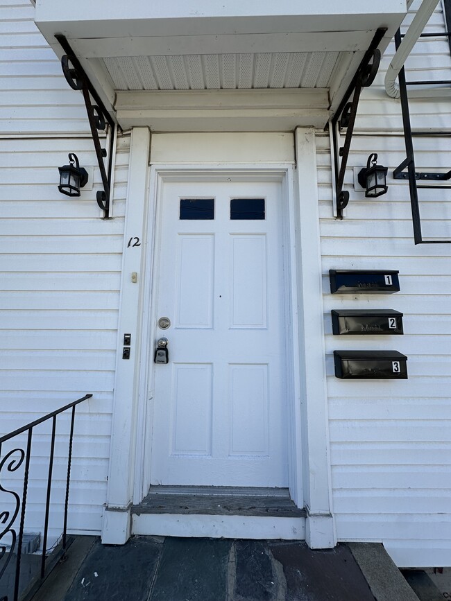 Front door with mailboxes for each unit - 12 Tiffany St