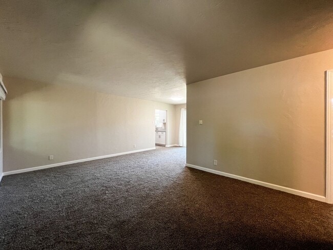 Building Photo - Freshly Renovated 3 Bedroom Home with Large Fenced Yard & Double Garage