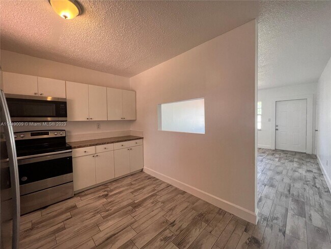 Building Photo - 19123 NW 36th Ave