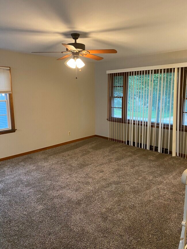 Family room- new window treatments - 404 Woodrow St