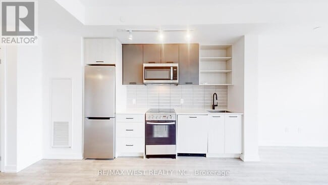 Building Photo - 2300-2300 St Clair Ave W