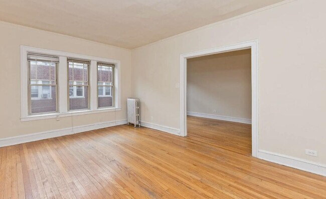 Building Photo - 1335 W Touhy Ave