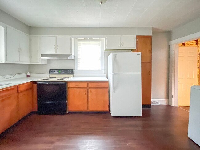 Building Photo - Dishwasher and Washer/Dryer Included