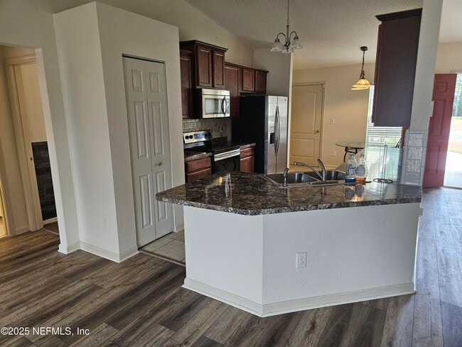 Building Photo - 15379 Bareback Dr